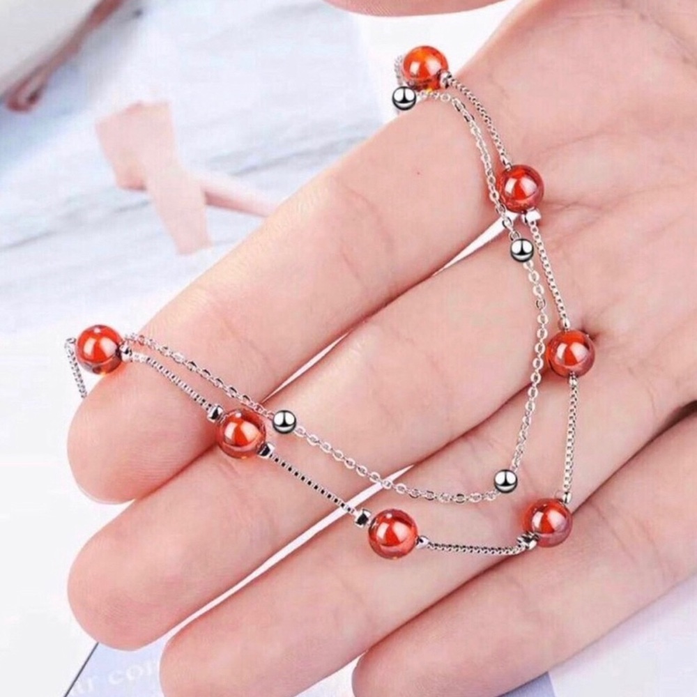 Sterling silver and garnet bracelet